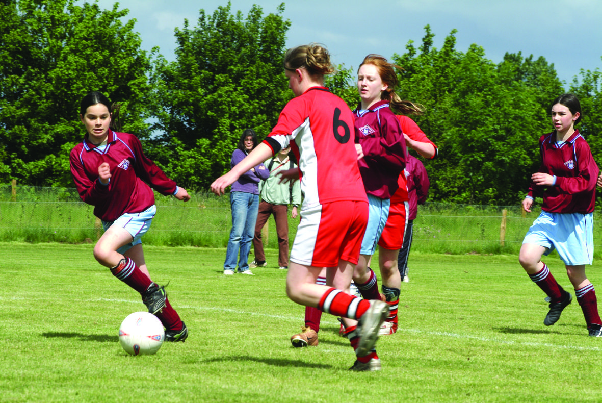 Girls play football