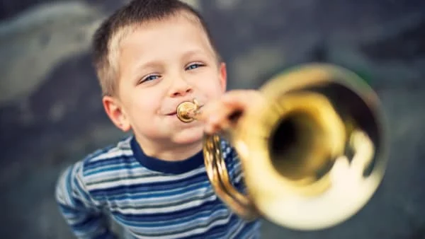Boy playing trumpet