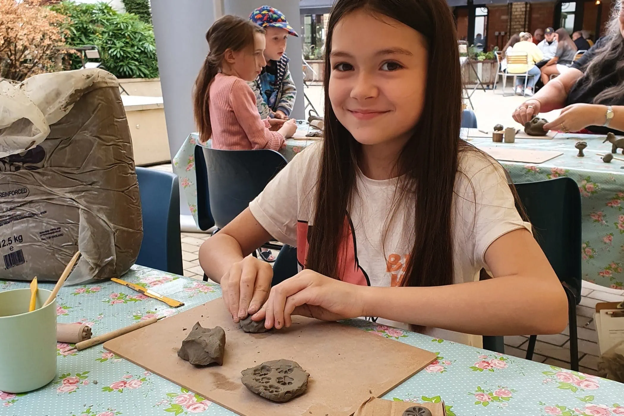 Child playing with clay