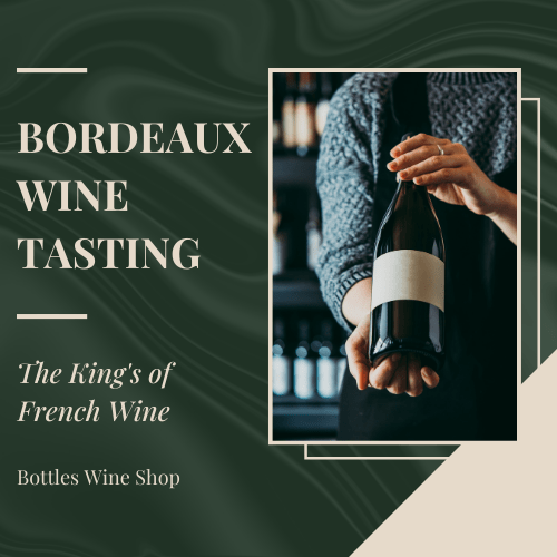 person holding a bottle of wine